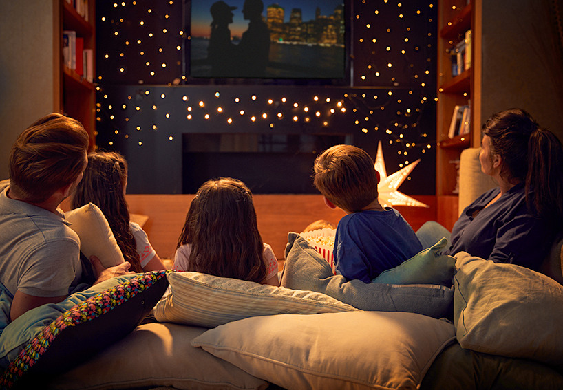 Family watching a movie
