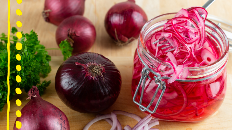 Pickled red onions in a jar, whole red onions